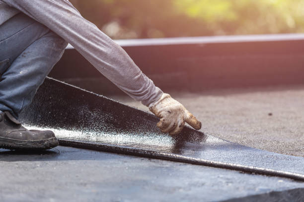 Professional Waterproofing technician working in Baldwin, MI